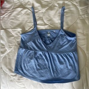 Cropped Me to We light blue tank top. Size medium